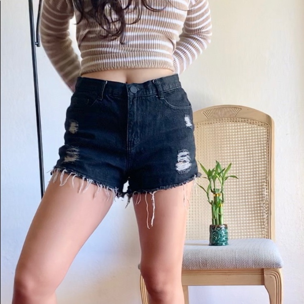black distressed shorts